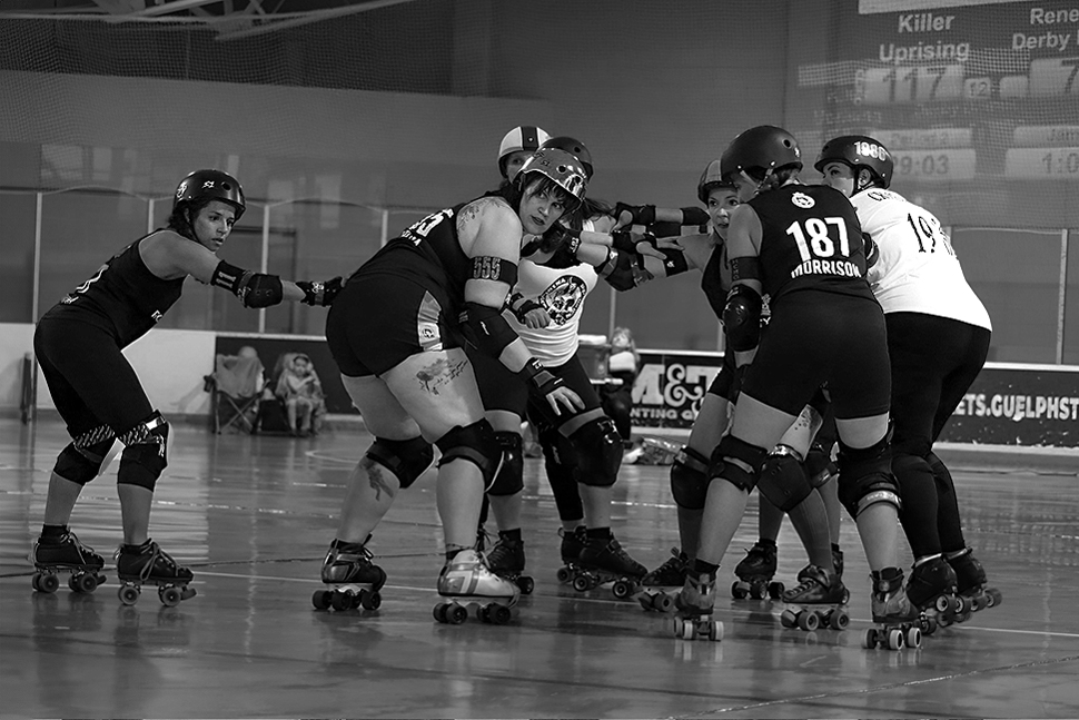 A pack of roller derby players